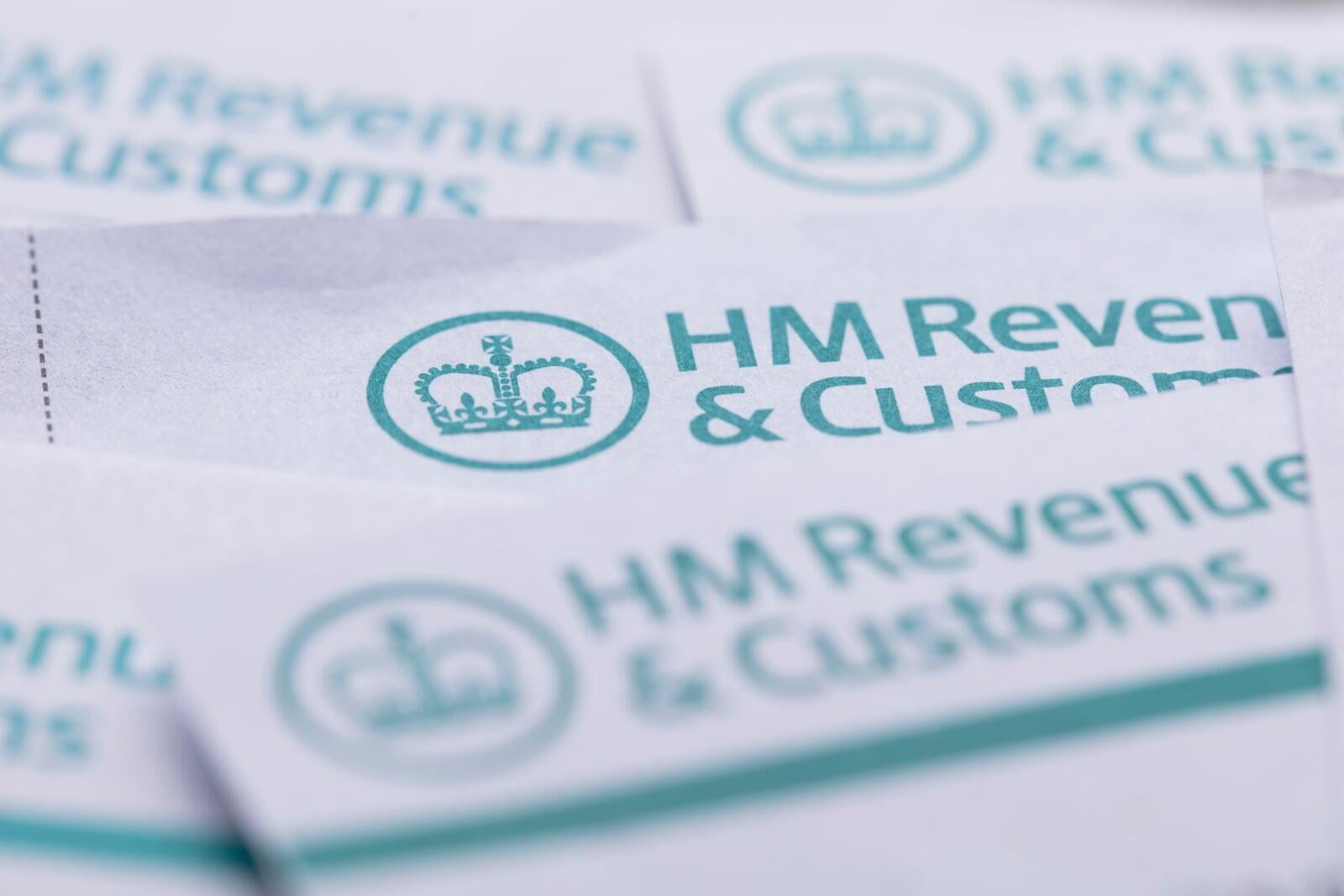 HMRC HM Revenue and Customs letter head on multiple letters scattered around on the desk.